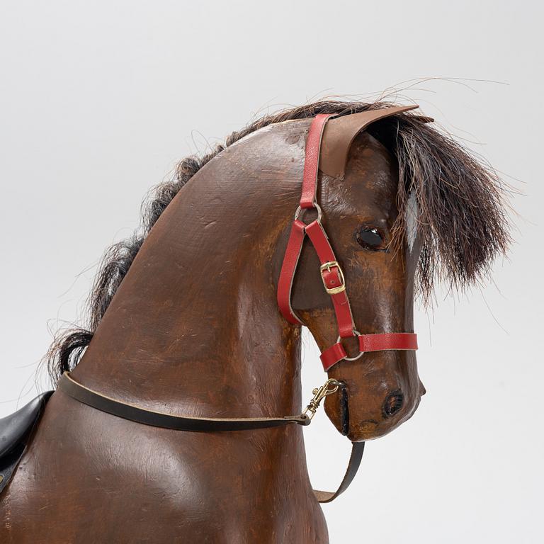 An early 20th century rocking horse.