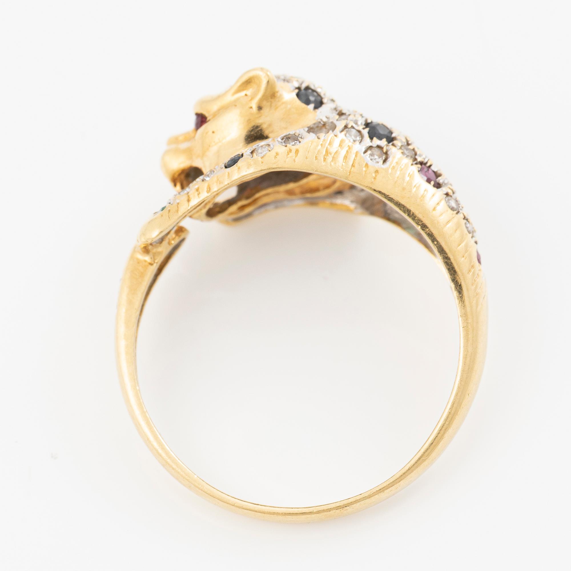 18K gold ring in the form of a panther with rubies, emeralds, sapphires and diamonds.
