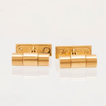 A pair of 18K gold cufflinks by Rolex.