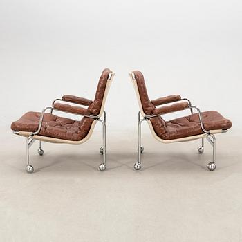 Bruno Mathsson, a pair of "Karin" armchairs, DUX, Sweden.