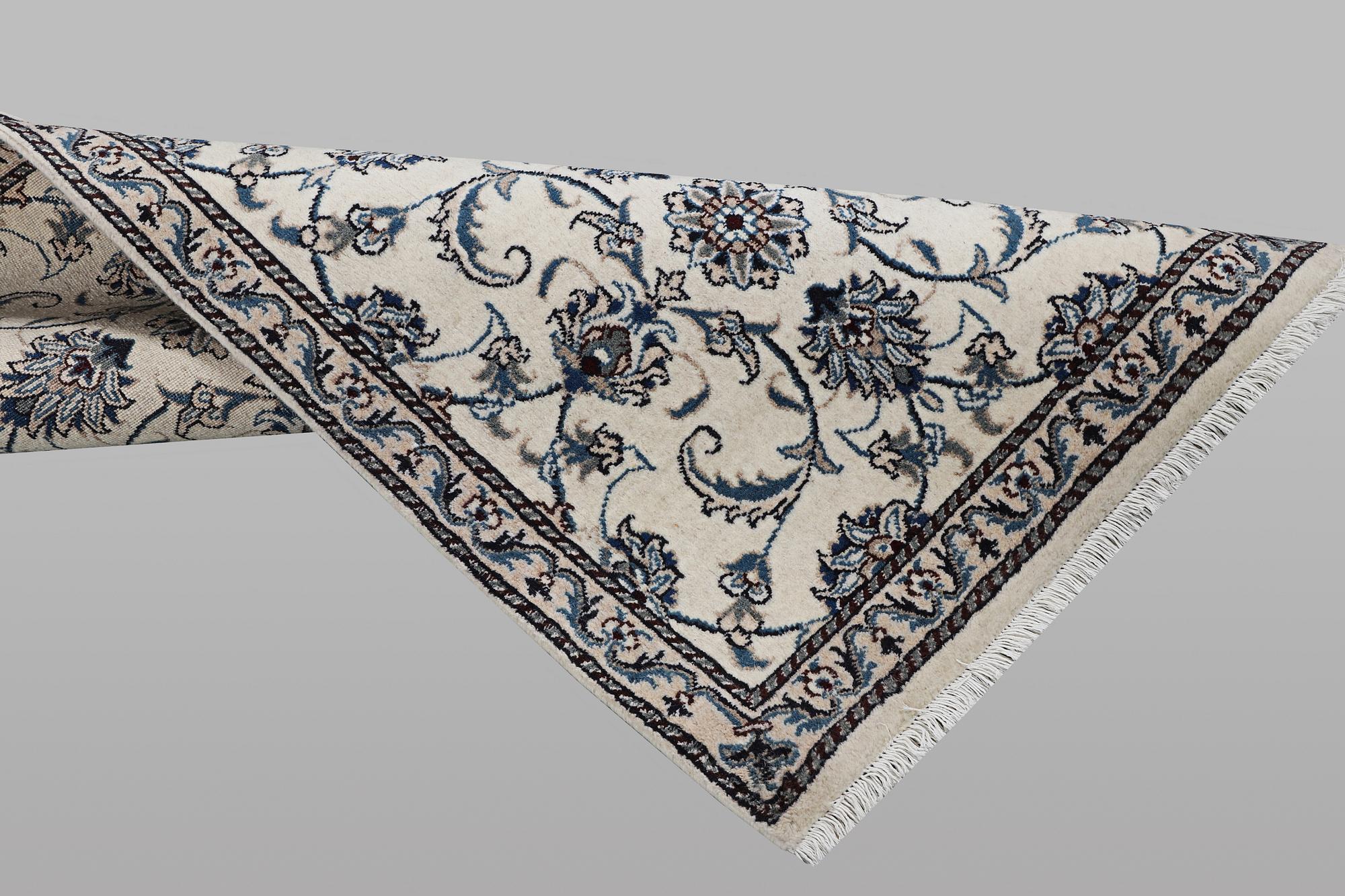 A runner carpet, Nain, part silk, ca 248 x 72 cm.