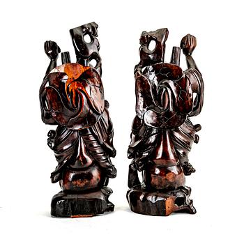 A pair of Japanese wooden sculptures, early 20th Century.