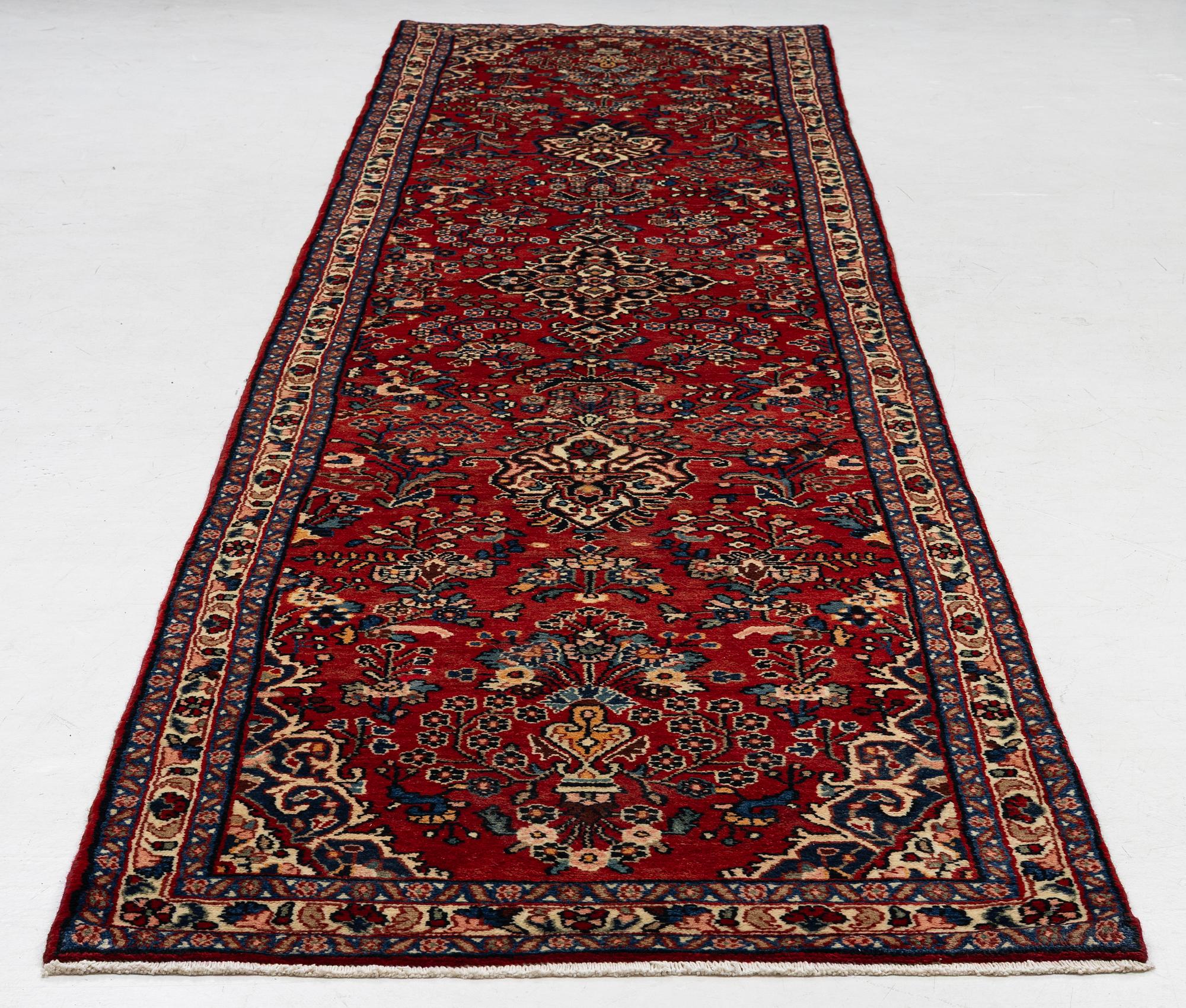 A Mehraban runner, c. 515 x 110 cm.