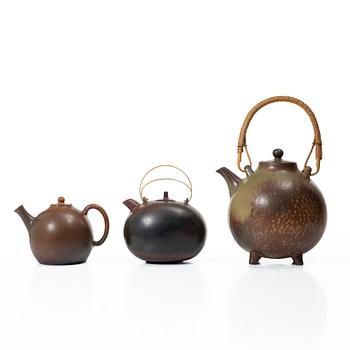 Gösta Grähs, , Gunnar Nylund and Carl-Harry Stålhane, three stoneware teapots, Rörstrand.