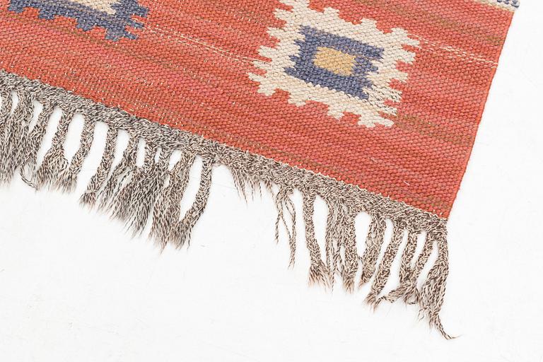 Märta Måås-Fjetterström, a carpet, "Röd grön äng", flat weave, ca 218 x 104 cm, signed AB MMF.