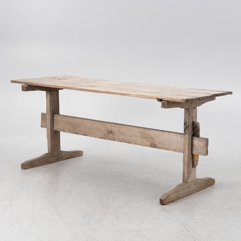 A wooden table, circa 1900.