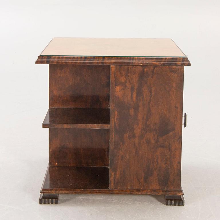 A 1930s birch side table.