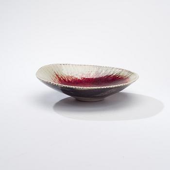 TOINI MUONA, A CERAMIC DISH.