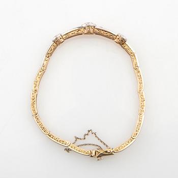Bracelet 14K gold and platinum with round old-cut diamonds approximately 1.74 ct in total.