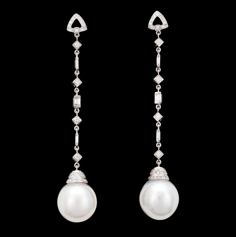 A pair of cultured South sea pearl and diamond earrings.