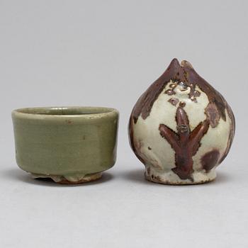 A Korean water dropper from the 19th Century and a celadon bowl, Ming dynasty (1368-1644).