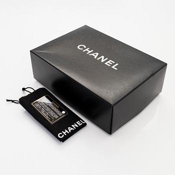 Chanel, A caviar leather clutch, 2006-2008.