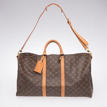 A Keepall Bandouliere 55 WEEKEND BAG by Louis Vuitton.