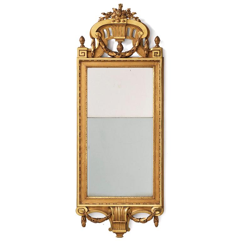 A Gustavian giltwood mirror, Stockholm, late 18th century.