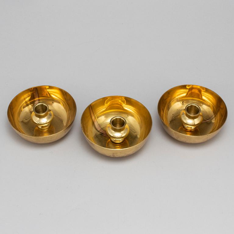 Three Vivianna Torun Bülow-Hübe brass candle golders, for Dansk International Design.