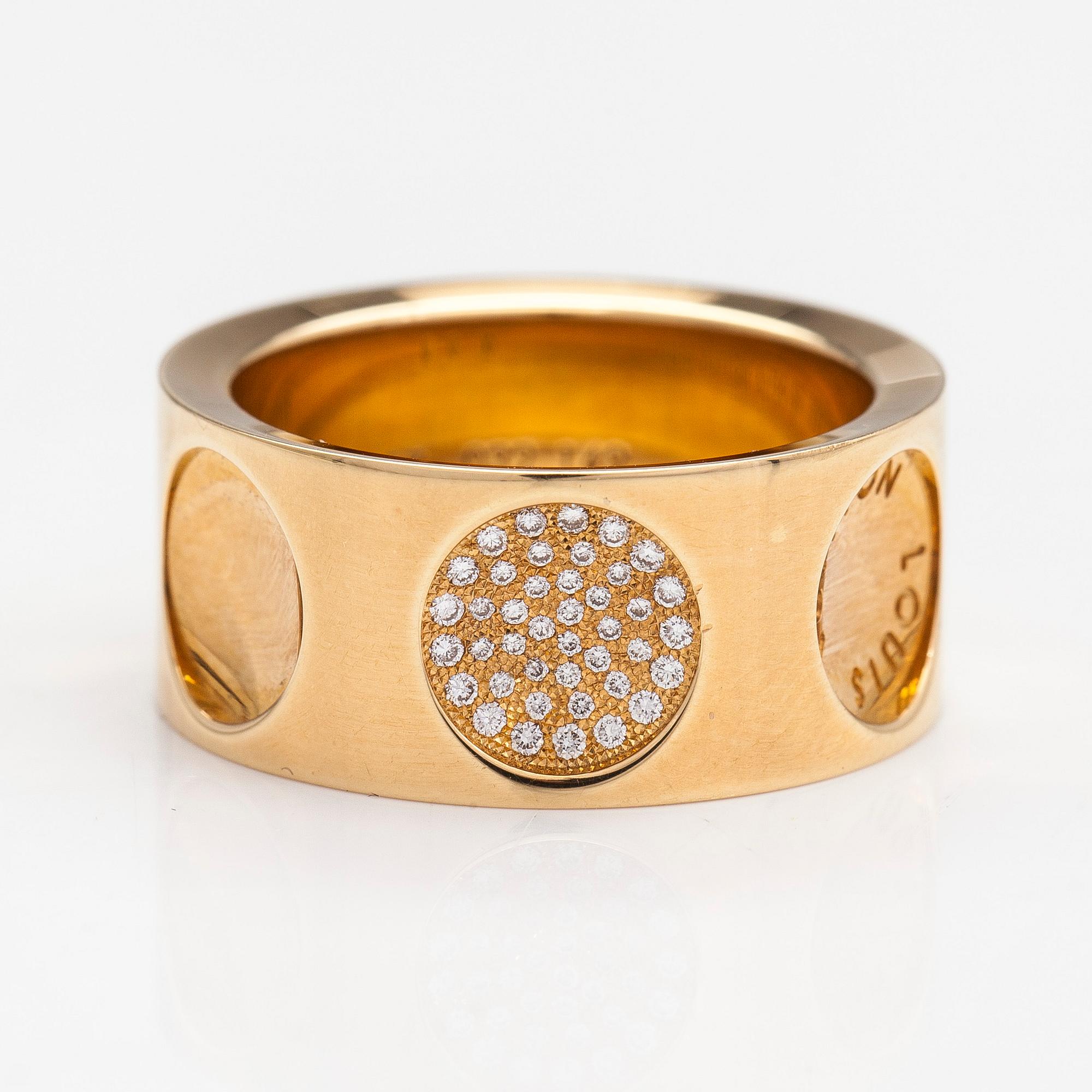 Louis Vuitton, an 18K gold 'Empreinte' ring with diamonds.