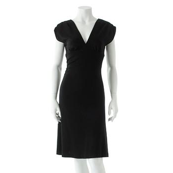 DIANE VON FURSTENBERG, a black wool dress.