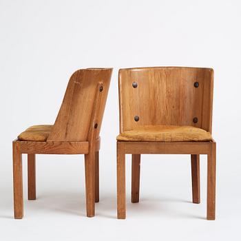 Axel Einar Hjorth, a pair of stained pine 'Lovö' chairs, Nordiska Kompaniet, Sweden 1930s.