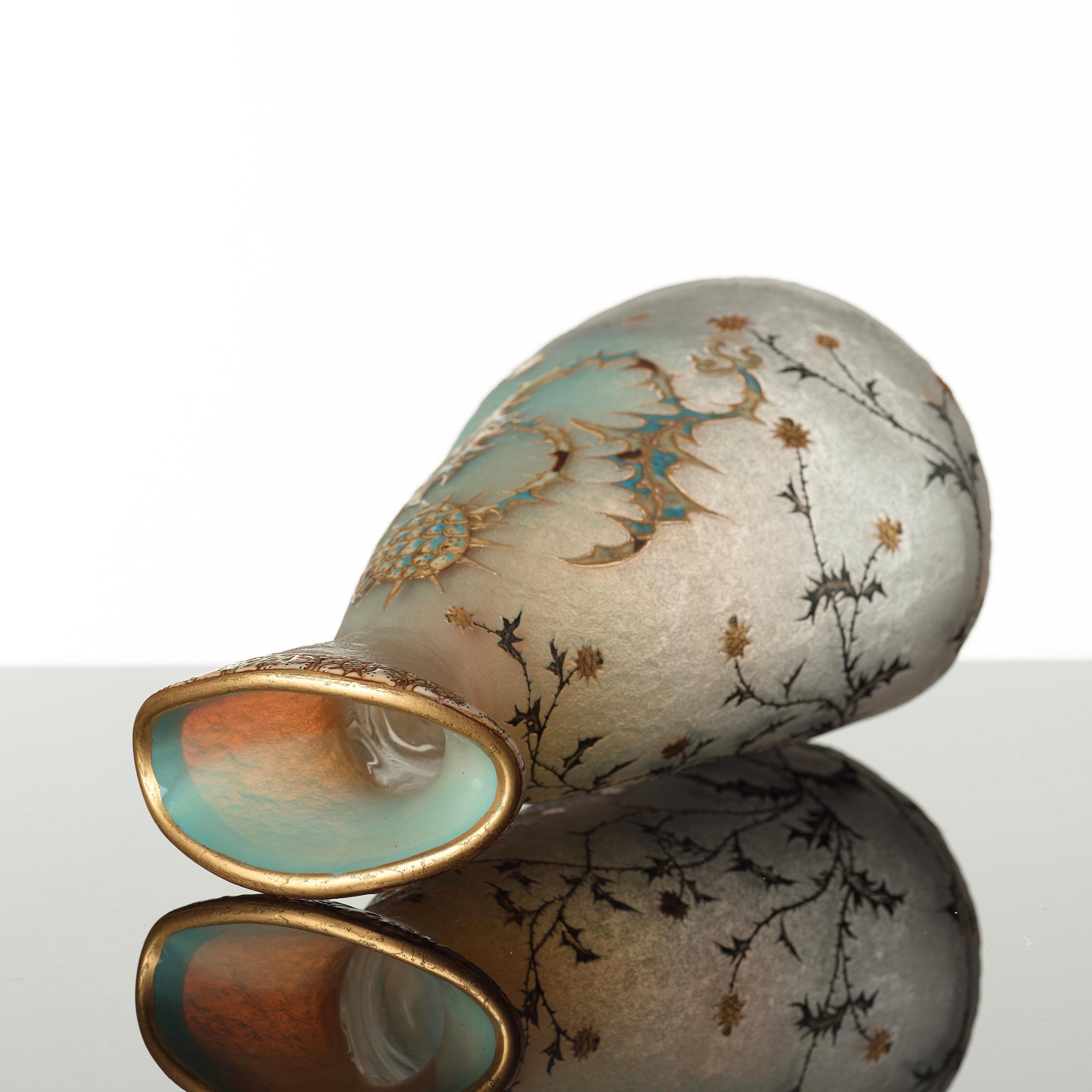 Daum, an opalescent etched and enamel painted glass vase, Nancy, France, 1890's.