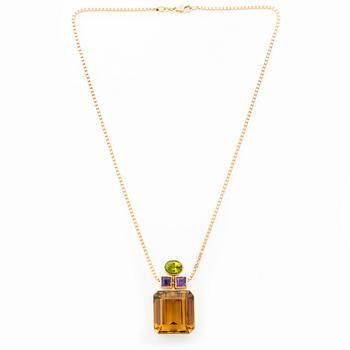 491. Kristian Nilsson, hänge 18K guld med en fasettslipad citrin, ametist pch peridot. Stockholm, 1986.