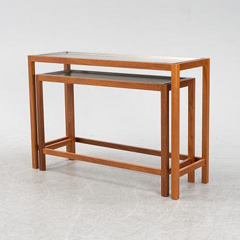 A model 548 set of two mahogany side tables with steel trays by Josef Frank for Firma Svenskt Tenn, designed 1934.