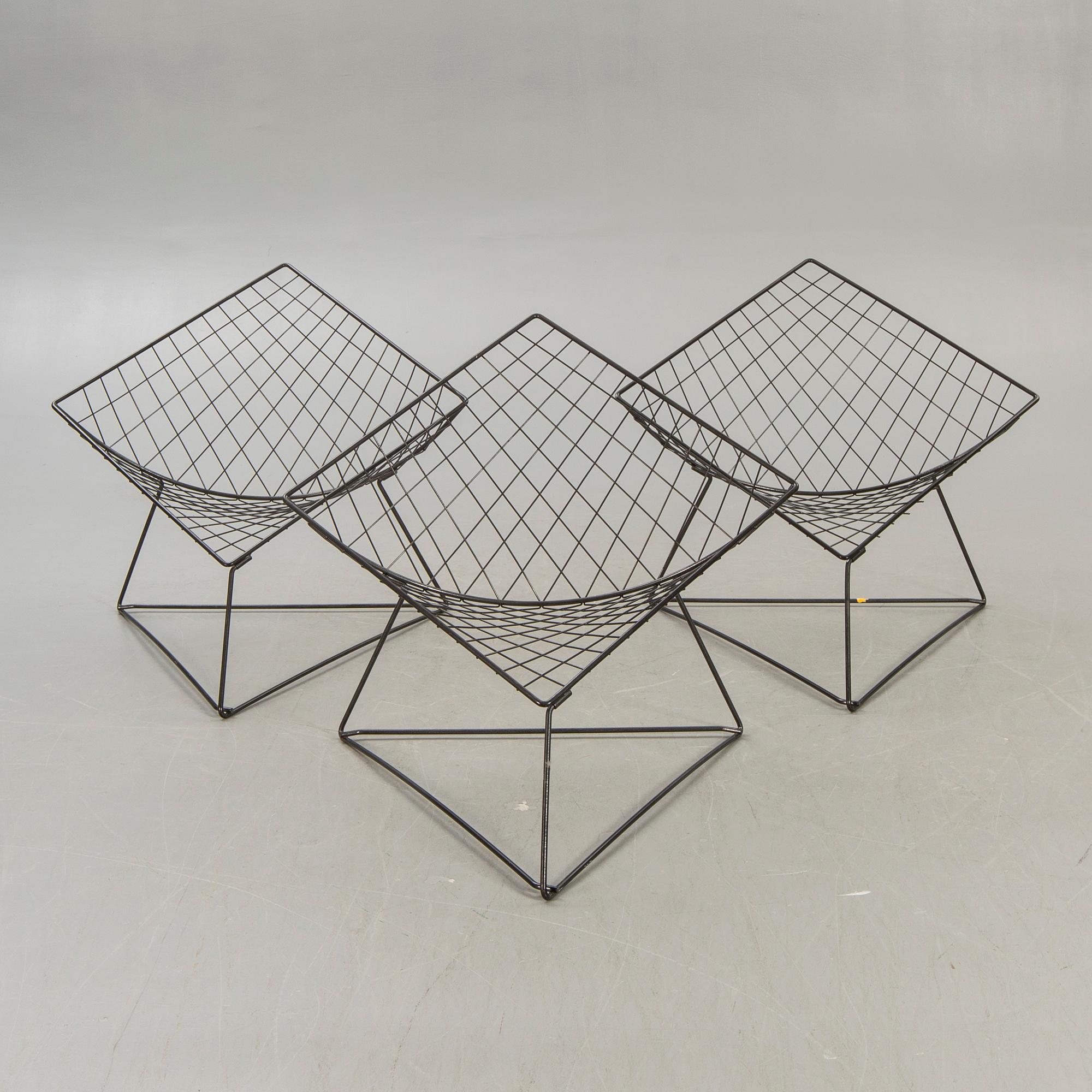 A set of three Niels Gammelgaard Oti easy chairs for IKEA 1970/80s.