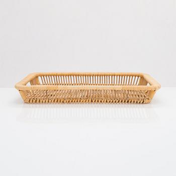 A mid-20th-century rattan serving tray, retailer Artek.