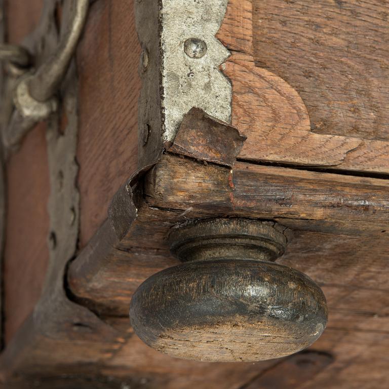 An oak wood chest dated 1710.
