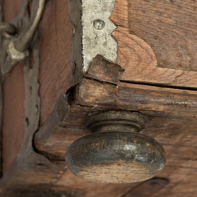 An oak wood chest dated 1710.