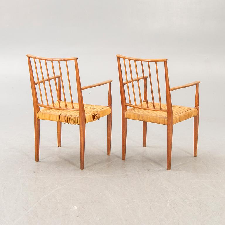 A pair of Josef Frank mahogany and rattan armchairs model nr 508 firma Svenskt Tenn mid 1900s.