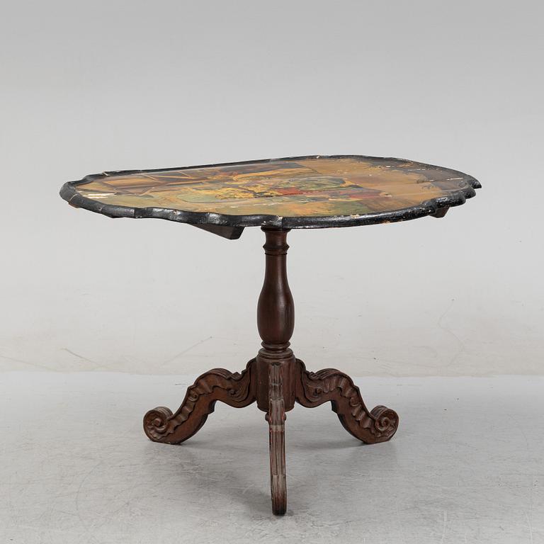 A transitional drop-leaf table, mid 18th Century.