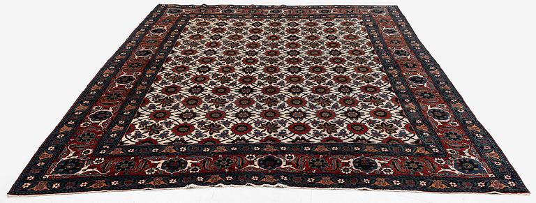 An antique Veramin carpet, West Persia, 380 x 271 cm.