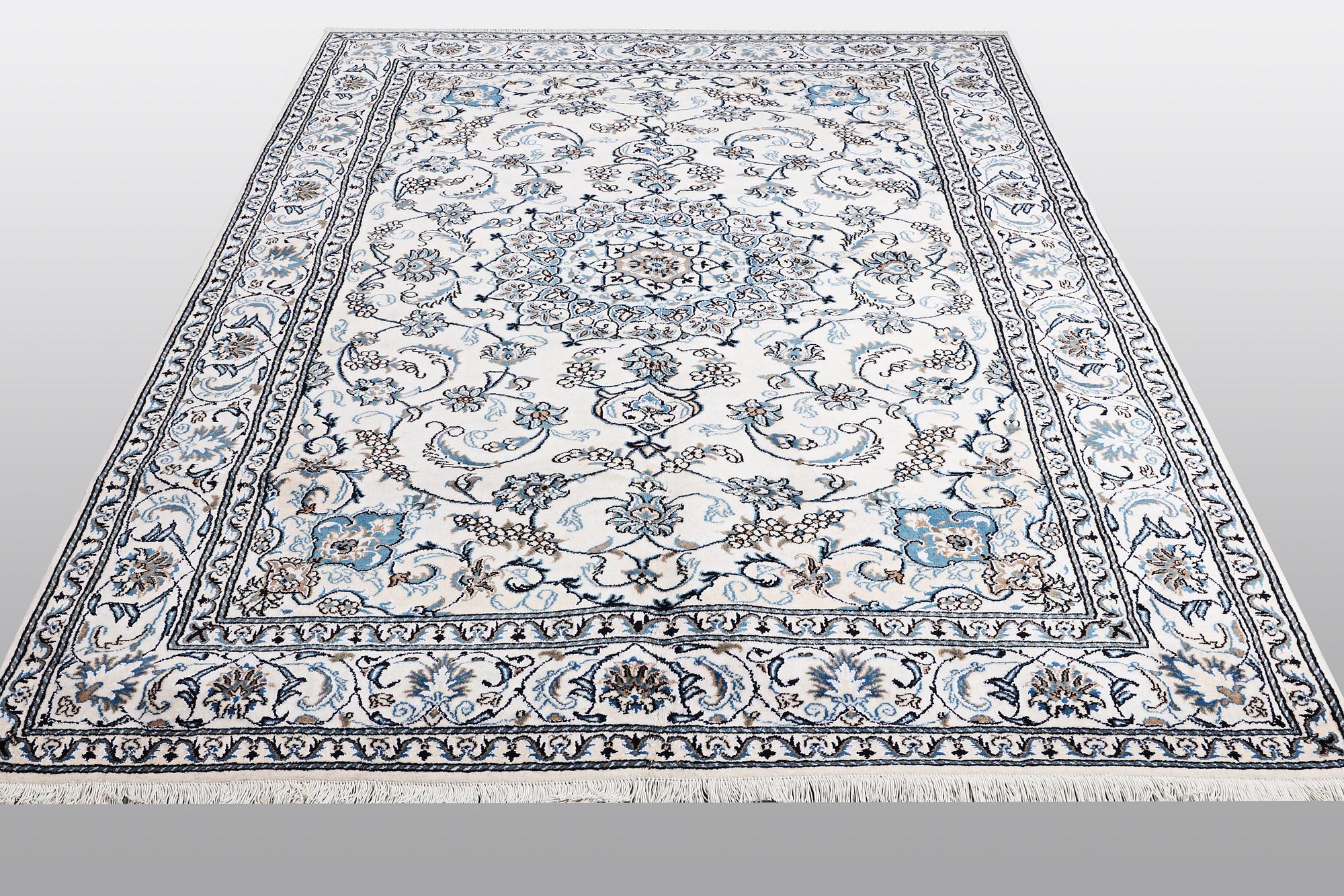 A carpet, Nain, 285 x 196 cm.