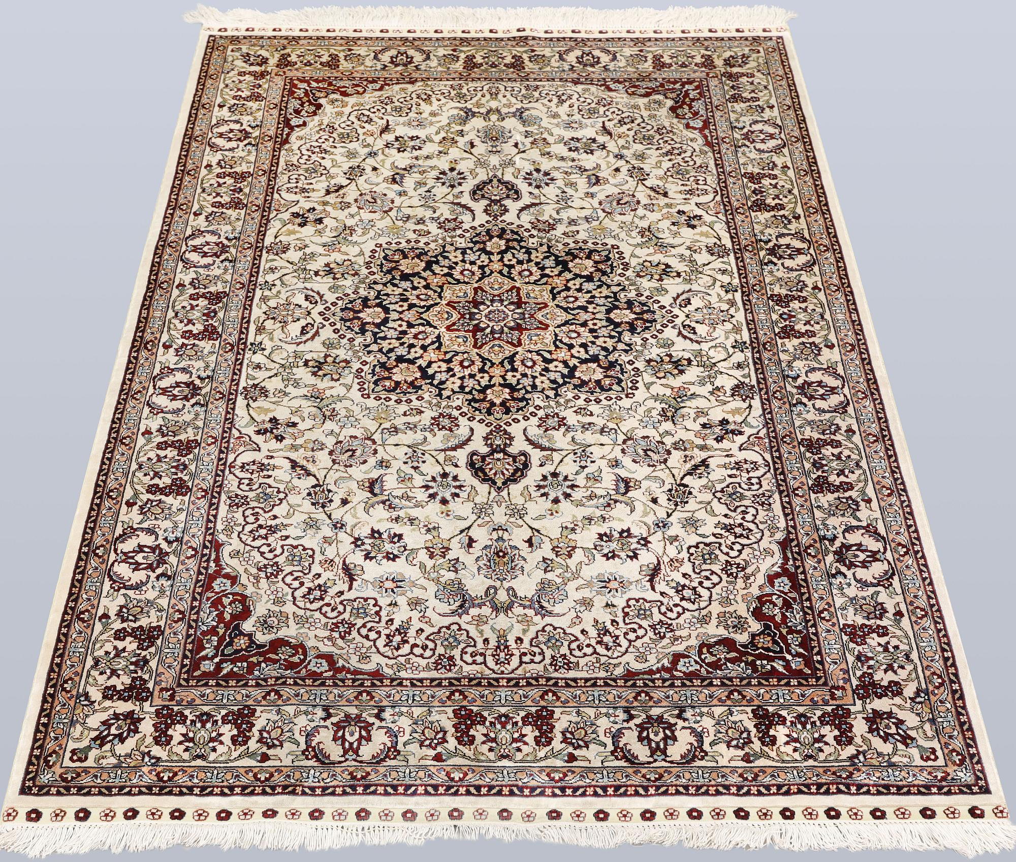 An Oriental silk rug, approx. 153 x 94 cm.