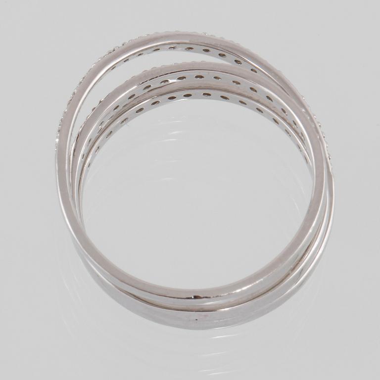 RING, 18K vitguld med briljantslipade diamanter 0.27 ct. Vikt 3,9 gram.