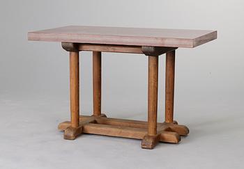 An Axel-Einar Hjorth stained birch 'Sandhamn' table with a later red limestone top, Nordiska Kompaniet ca 1929.