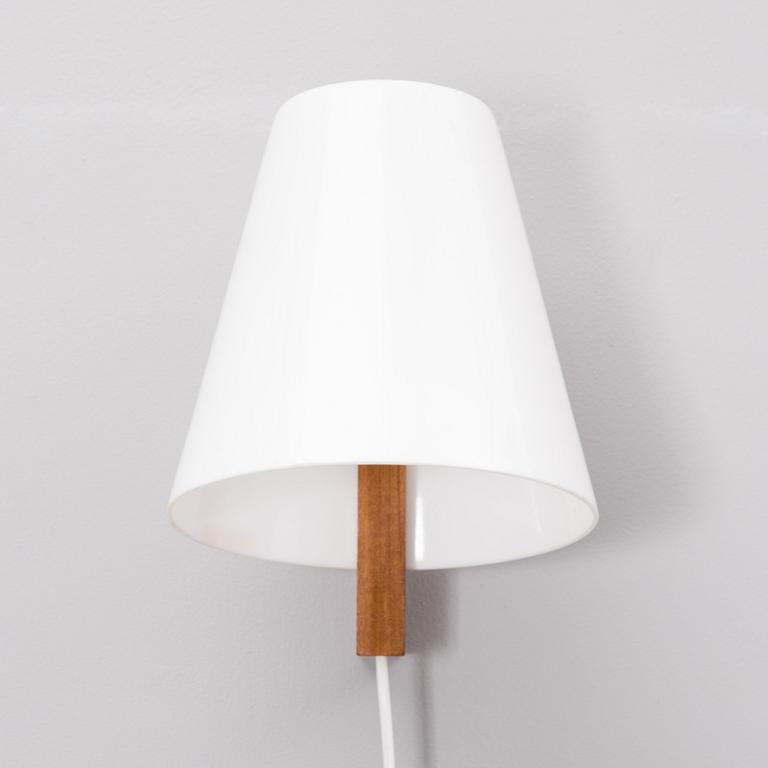 a 1960s wall lamp made by Sanka for Stockmann.