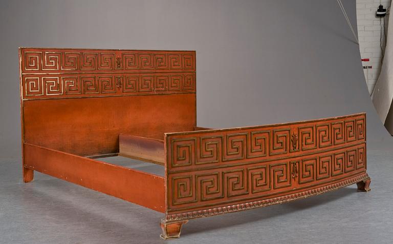 An Axel-Einar Hjorth red lacquered  bed, "Åbo", (without a mattress), Nordiska Kompaniet, 1929-30.