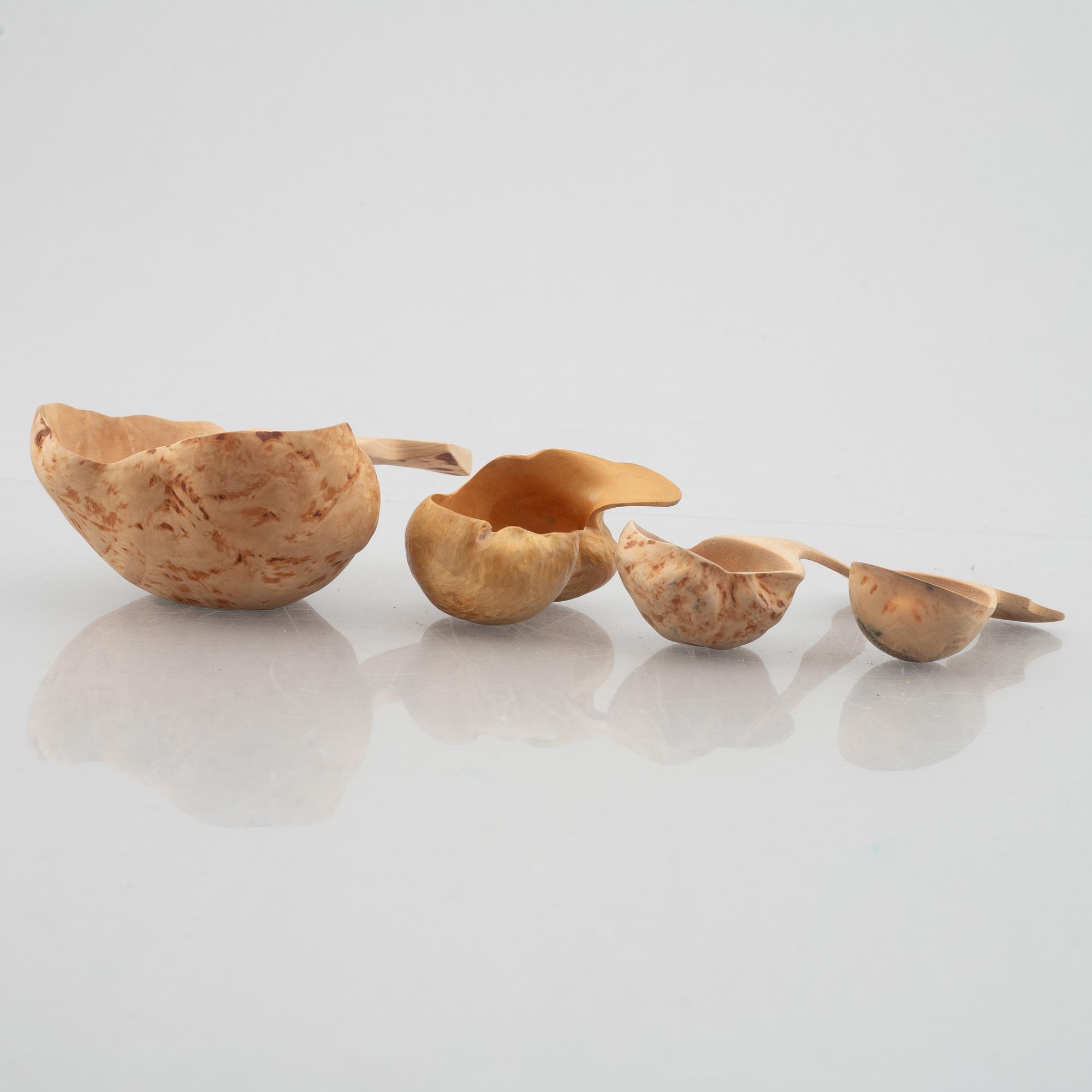 Ten carved burl wood bowls and cups, Sweden, 20th century.