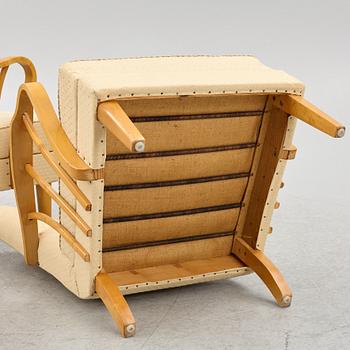 A pair of 1940s Swedish Modern armchairs.