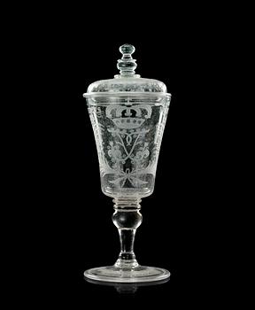 717. A large engraved late baroque armorial goblet with cover, Kungsholms glasbruk, first half of 18th Century.