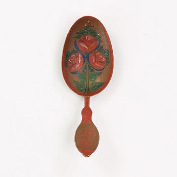 a swedish painted wooden spoon from the 19th century.