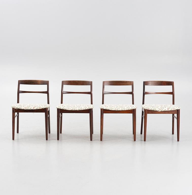 A Rosewood dining table and four chairs, Denmark. 1960-tal.