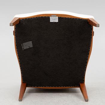 Josef Frank, a pair of armchairs, model 969, Svenskt Tenn.