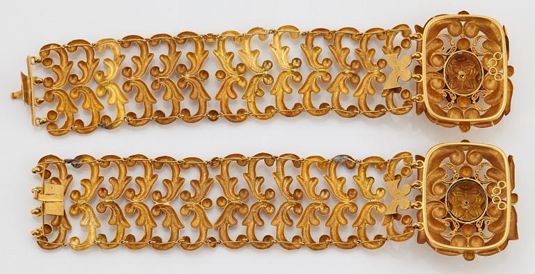 A pair of 19th century 18K gold bracelets.