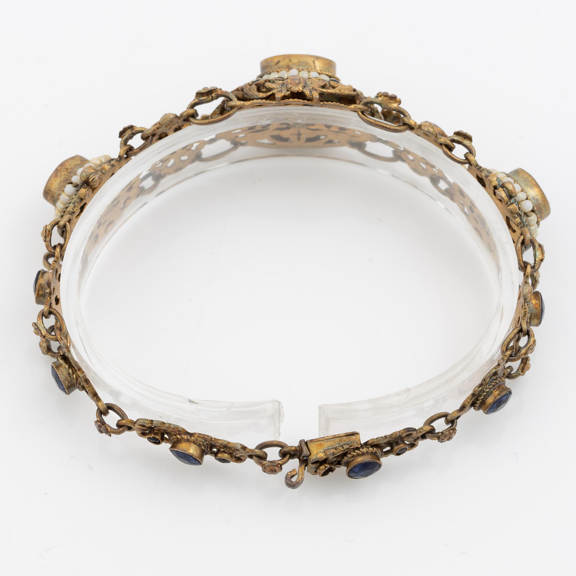 Bracelet, gilded silver with synthetic blue stones.