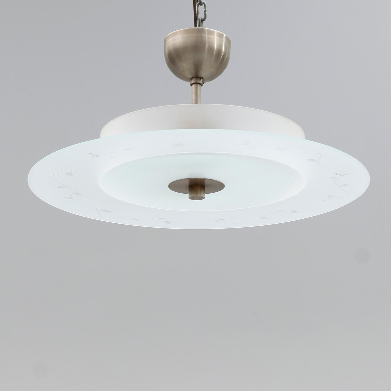 TAKLAMPA, 1900-talets mitt.