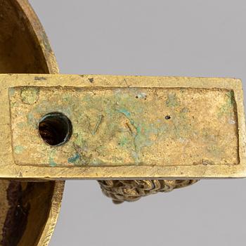 A 19th century bronze church candlestick.