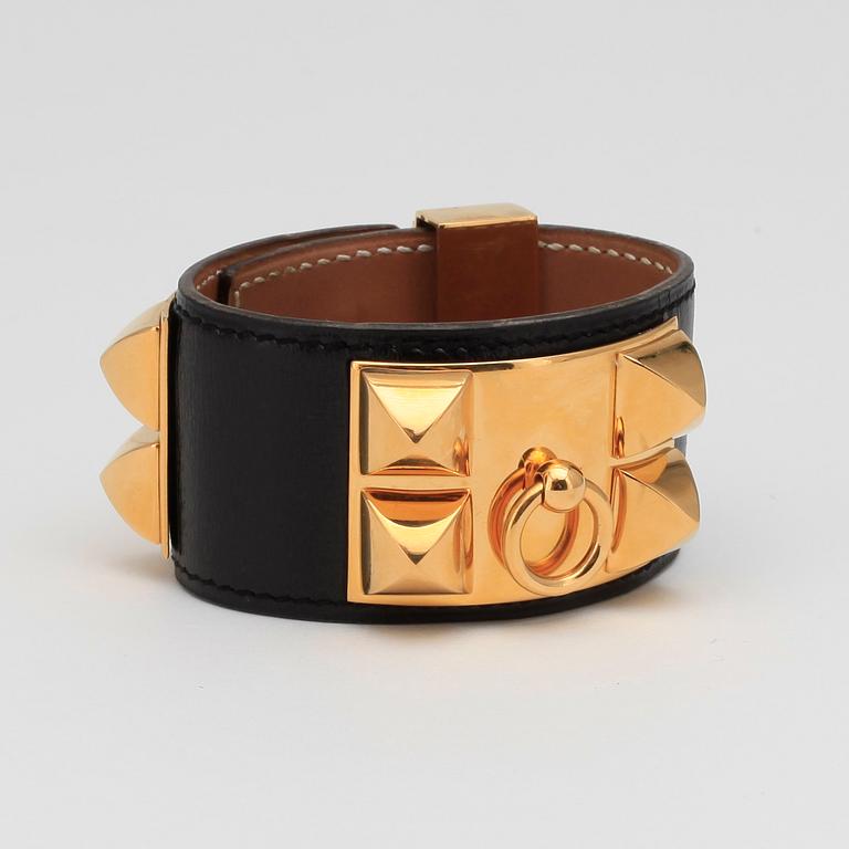 HERMÈS, a black "Collier de Chien" bracelet.