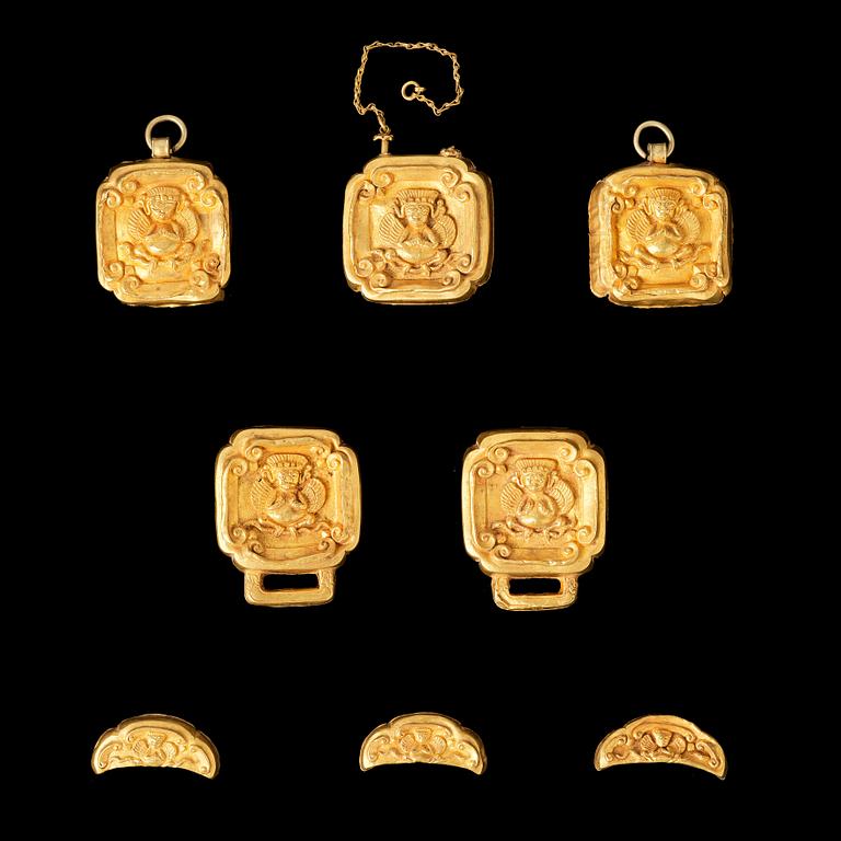 A set of eight gold 'Garuda' belt plaques, Yuan/early Ming dynasty.